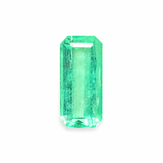 front view of Natural Colombian Emerald – Elongated Emerald Cut in white background 