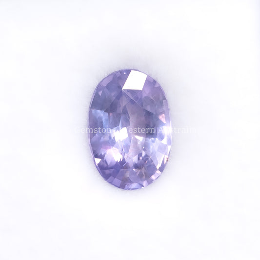 Front View of 1.72 Ct Natural Violet Sapphire Loose Gemstone Oval Cut in white background.