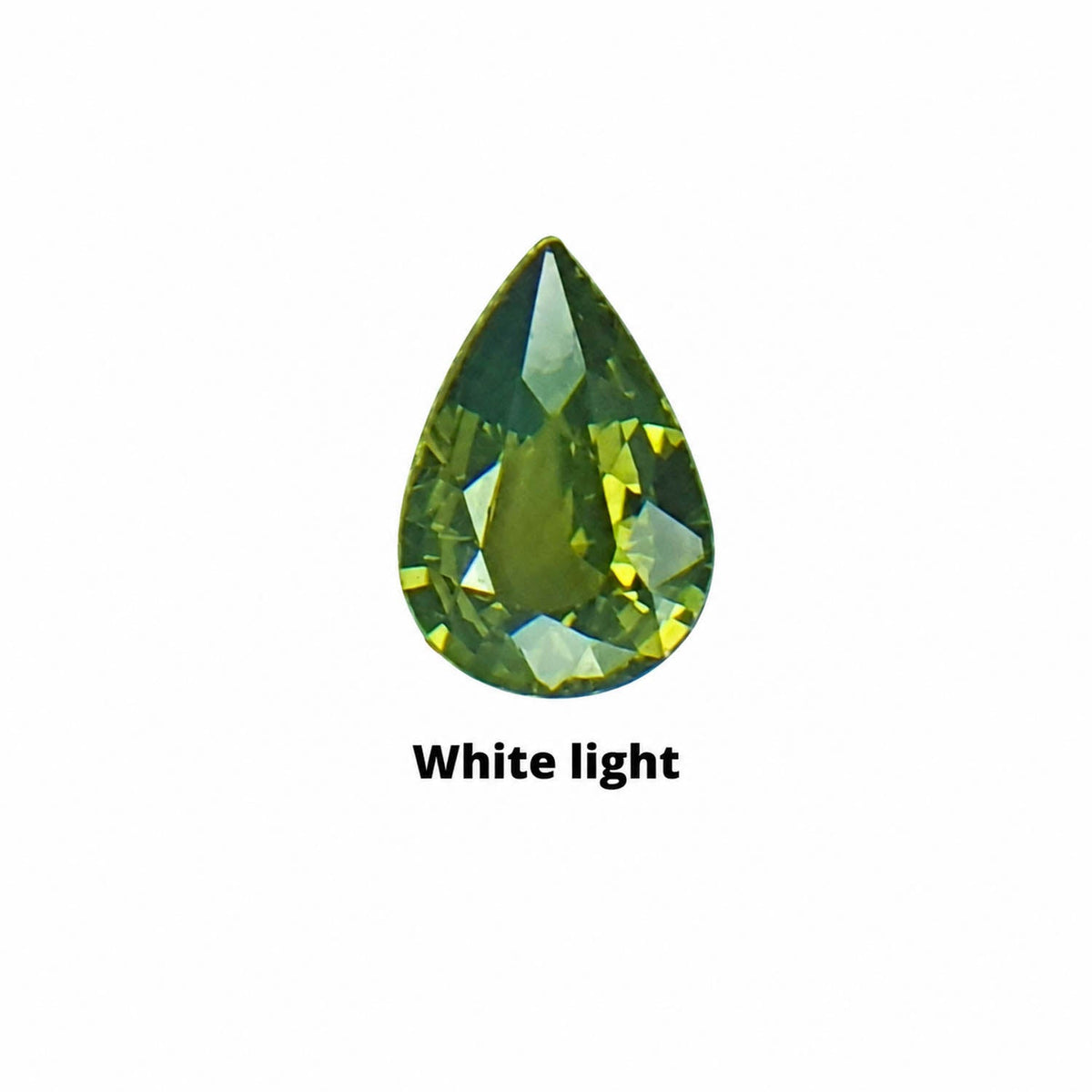 0.70 ct pear cut alexandrite photographed in daylight