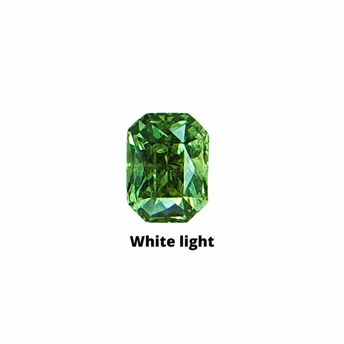 0.80 ct emerald cut alexandrite photographed in daylight
