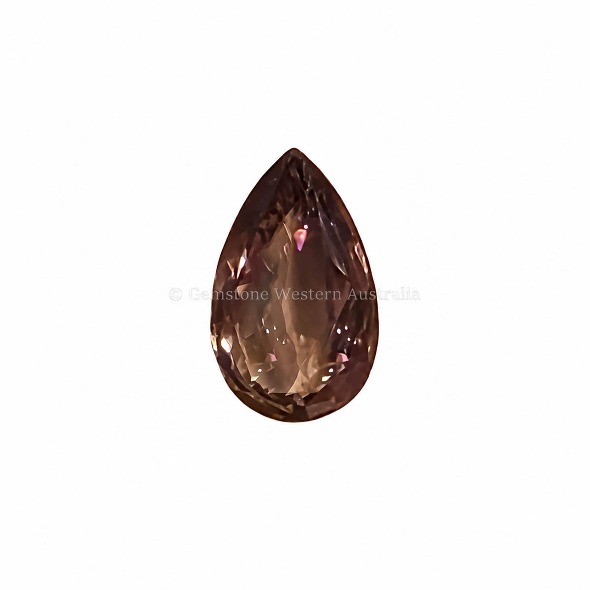 1.98 ct alexandrite under warm light showing its colour change