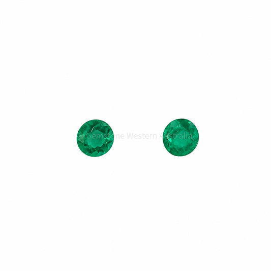 Matched pair of natural Colombian emeralds totalling 0.15 ct, round cut