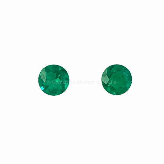 Matched pair of natural Colombian emeralds totalling 0.28 ct, round cut