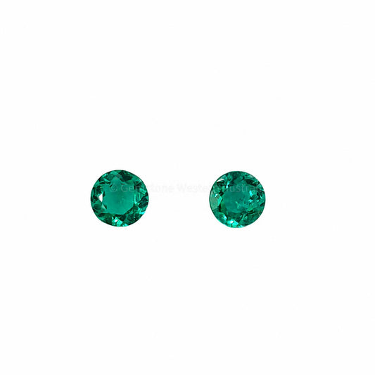 Matched pair of natural Colombian emeralds totalling 0.19 ct, round cut