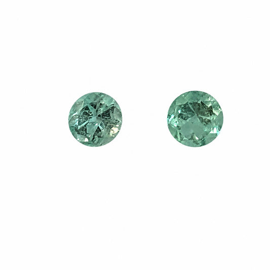 Matched pair of natural Colombian emeralds totalling 0.61 ct, round cut