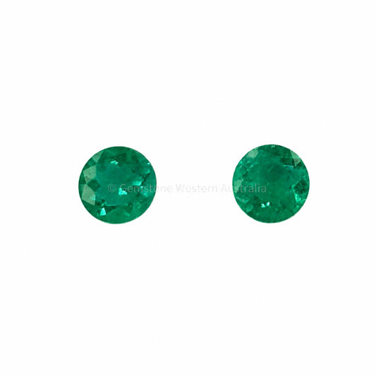 Matched pair of natural Colombian emeralds totalling 0.39 ct, round cut