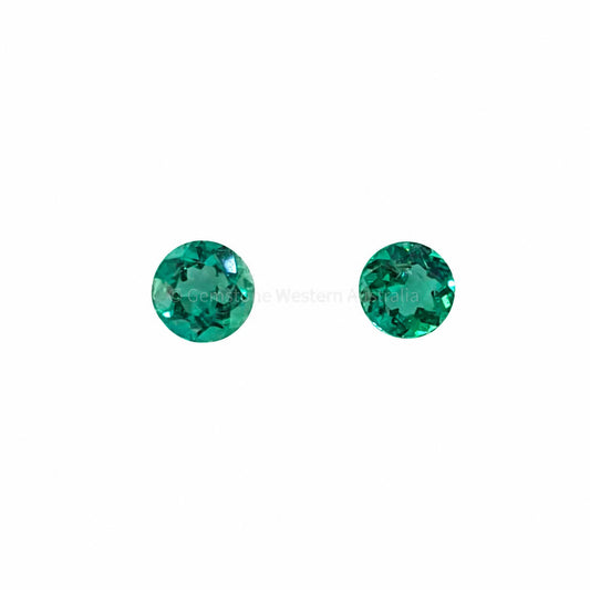 Matched pair of natural Colombian emeralds totalling 0.23 ct, round cut