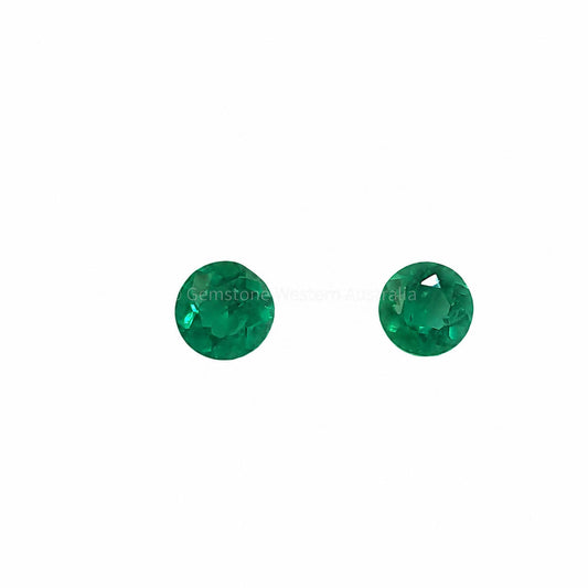 Matched pair of natural Colombian emeralds totalling 0.32 ct, round cut
