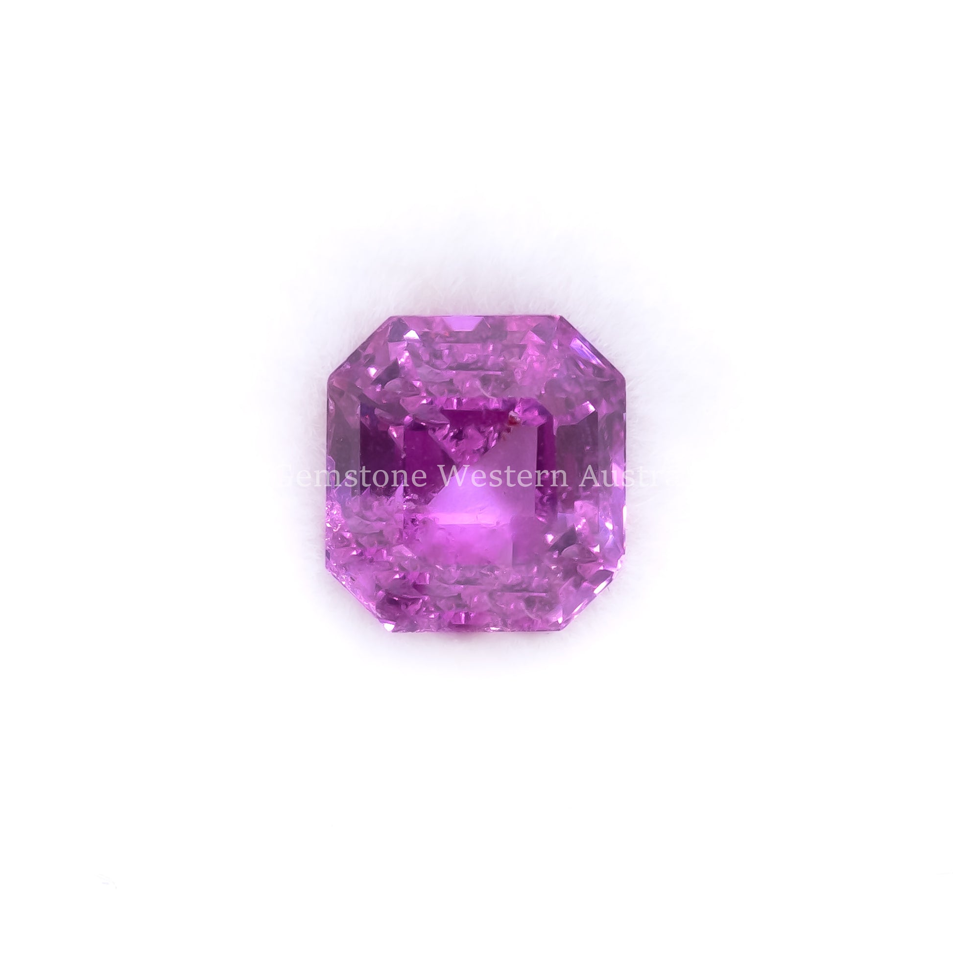 Front view of 1.67CT Natural Unheated Pink Sapphire – Octagon Step Cut in white background.