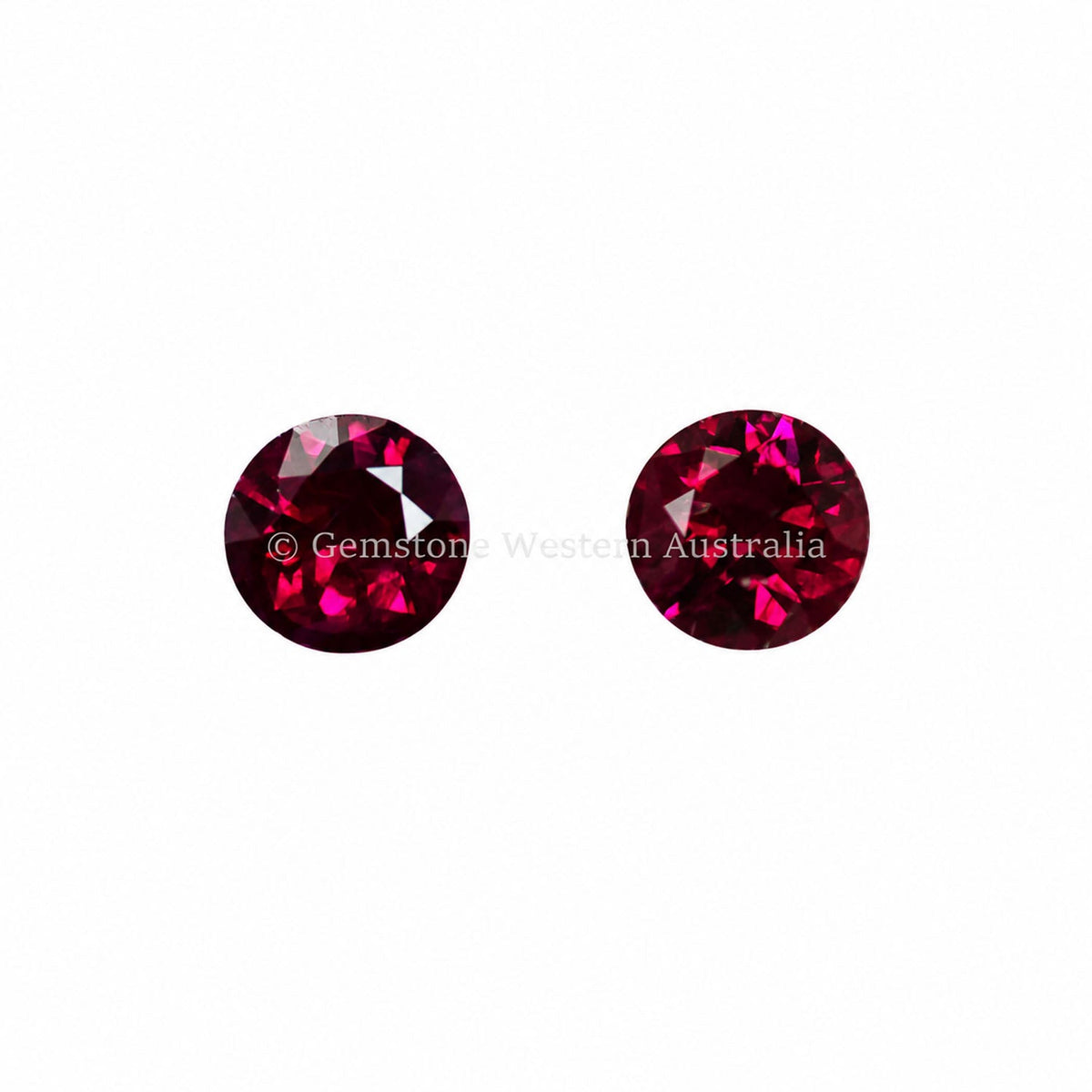 Matched pair of natural rubies totalling 0.48 ct, round cut