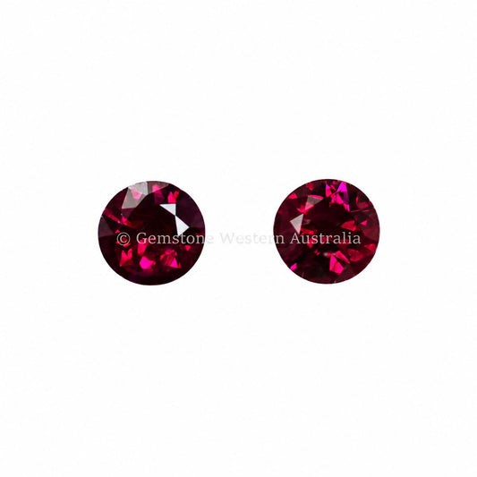 Matched pair of natural rubies totalling 0.48 ct, round cut