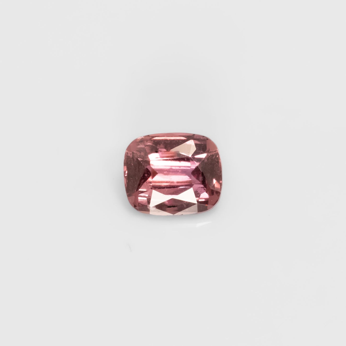 Front view of 1.06CT Natural Unheated Pink Sapphire – Cushion Cut in white background