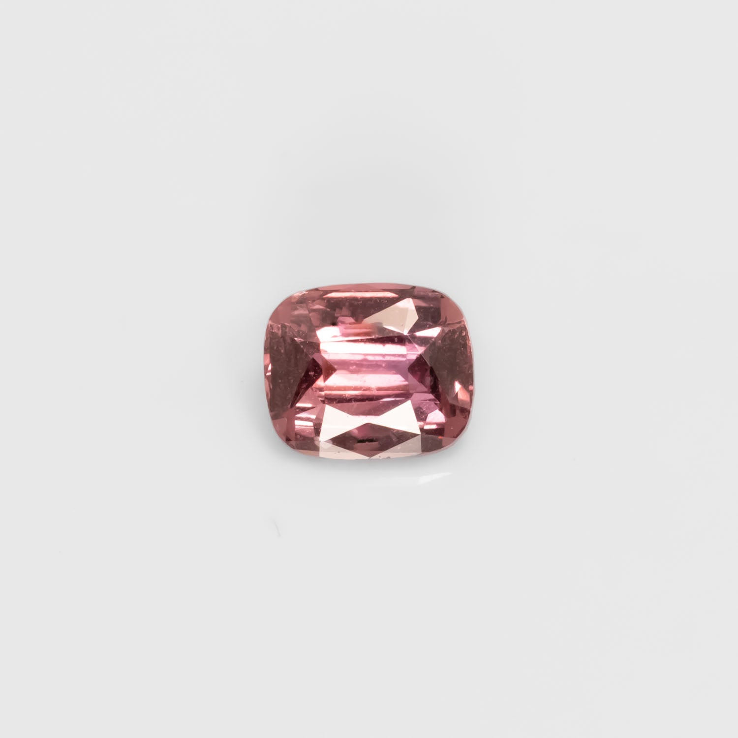 Front view of 1.06CT Natural Unheated Pink Sapphire – Cushion Cut in white background