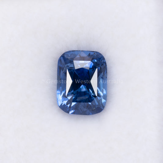 2.57CT NATURAL HEATED CORNFLOWER BLUE SAPPHIRE - CUSHION RECTANGULAR CUT IN WHITE BACKGROUND