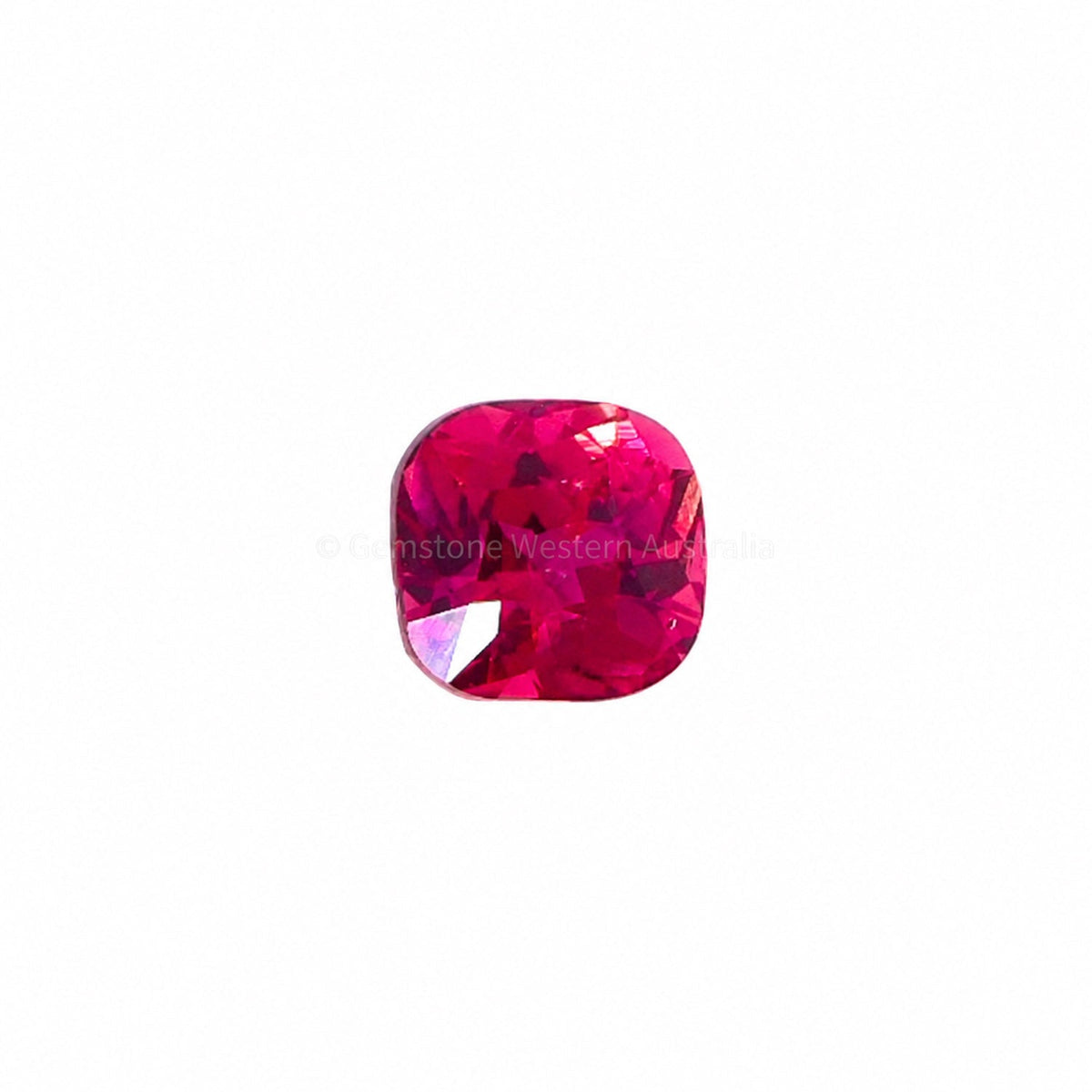 1.25 ct hot pink sapphire cushion cut shown at an angle