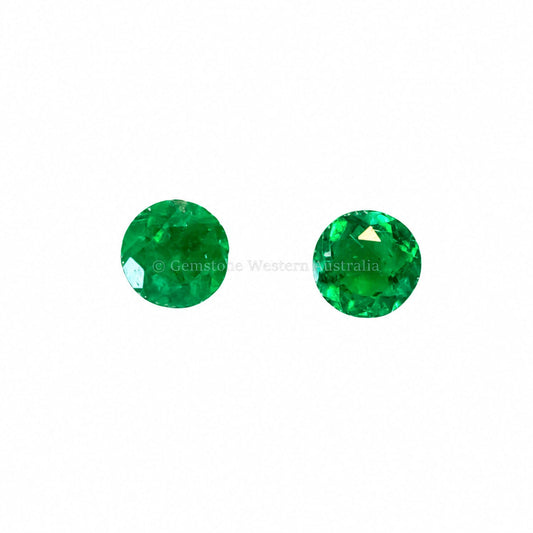 Matched pair of natural Colombian emeralds totalling 0.26 ct, round cut