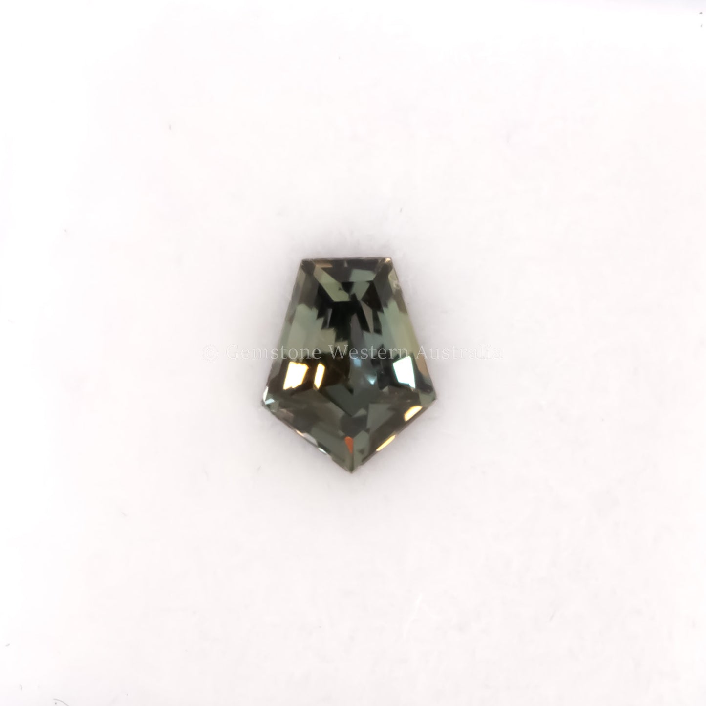 0.69 CT NATURAL UNHEATED TEAL-GREEN SAPPHIRE - SHIELD FANCY CUT