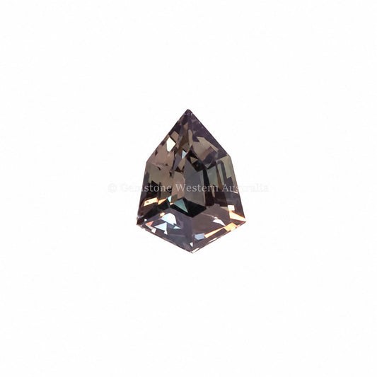 0.70 ct natural unheated brownish-green-red sapphire, shield fancy cut