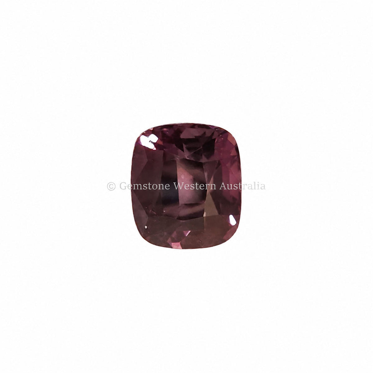 1.18 ct alexandrite under warm light showing its colour change