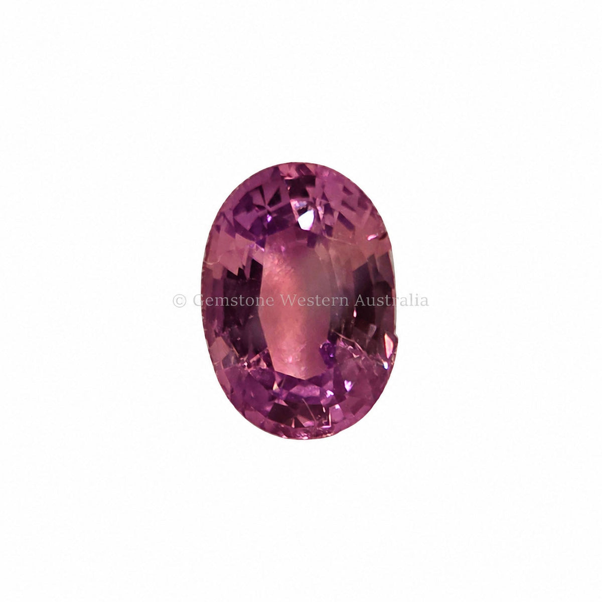 1.18 ct alexandrite under warm light showing its colour change