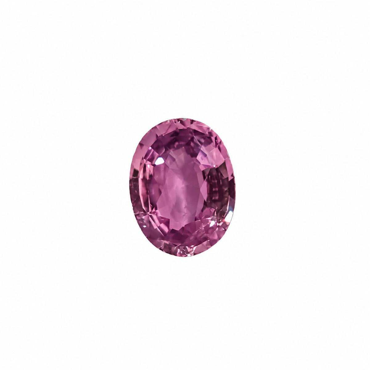 1.02 ct alexandrite under warm light showing its colour change