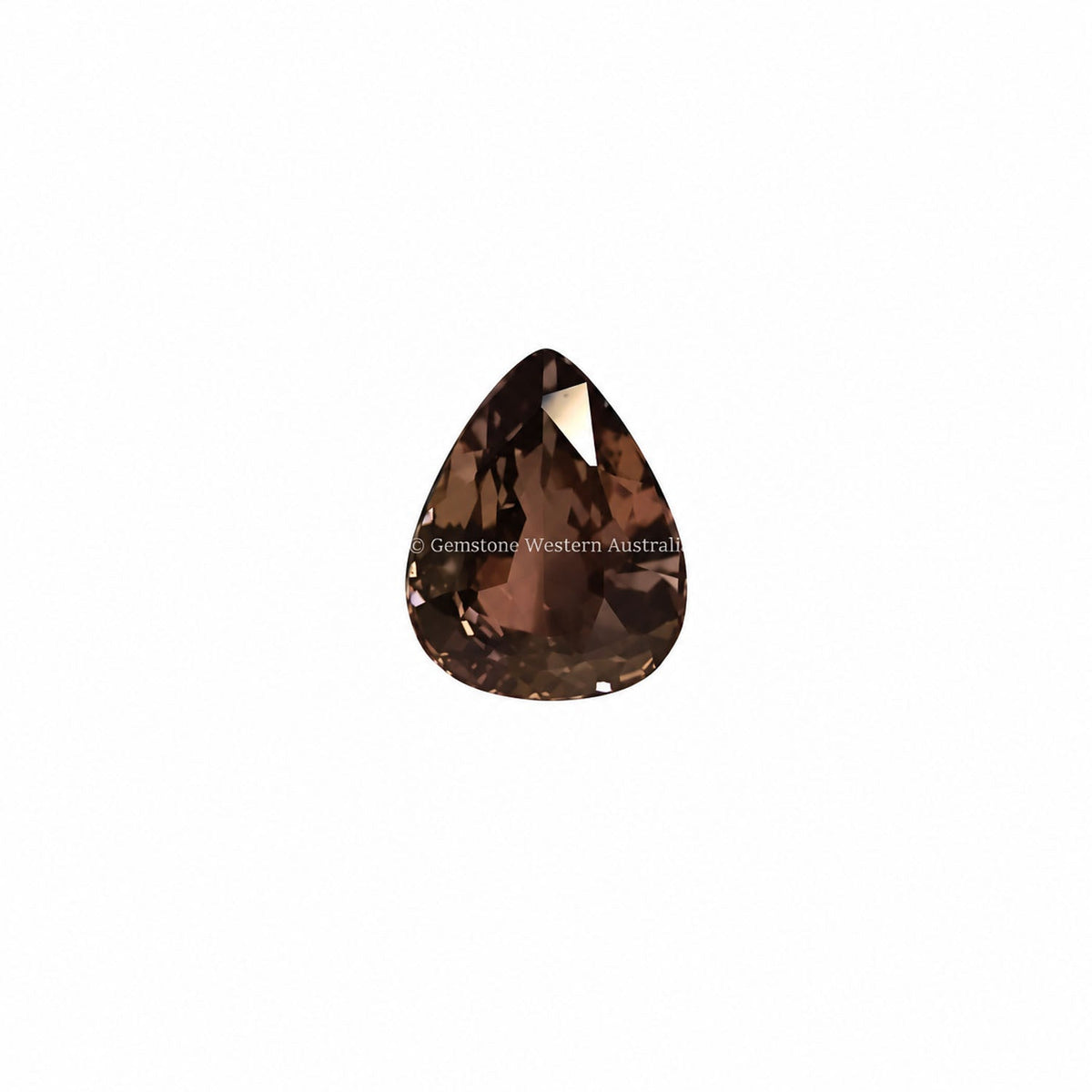 0.63 ct alexandrite under warm light showing its colour change