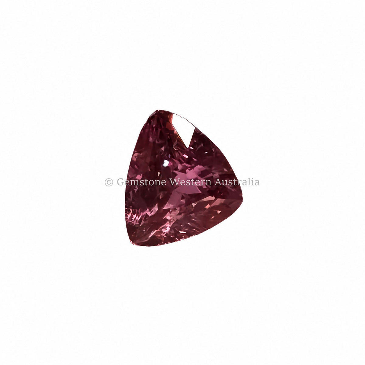 1.05 ct alexandrite under warm light showing its colour change