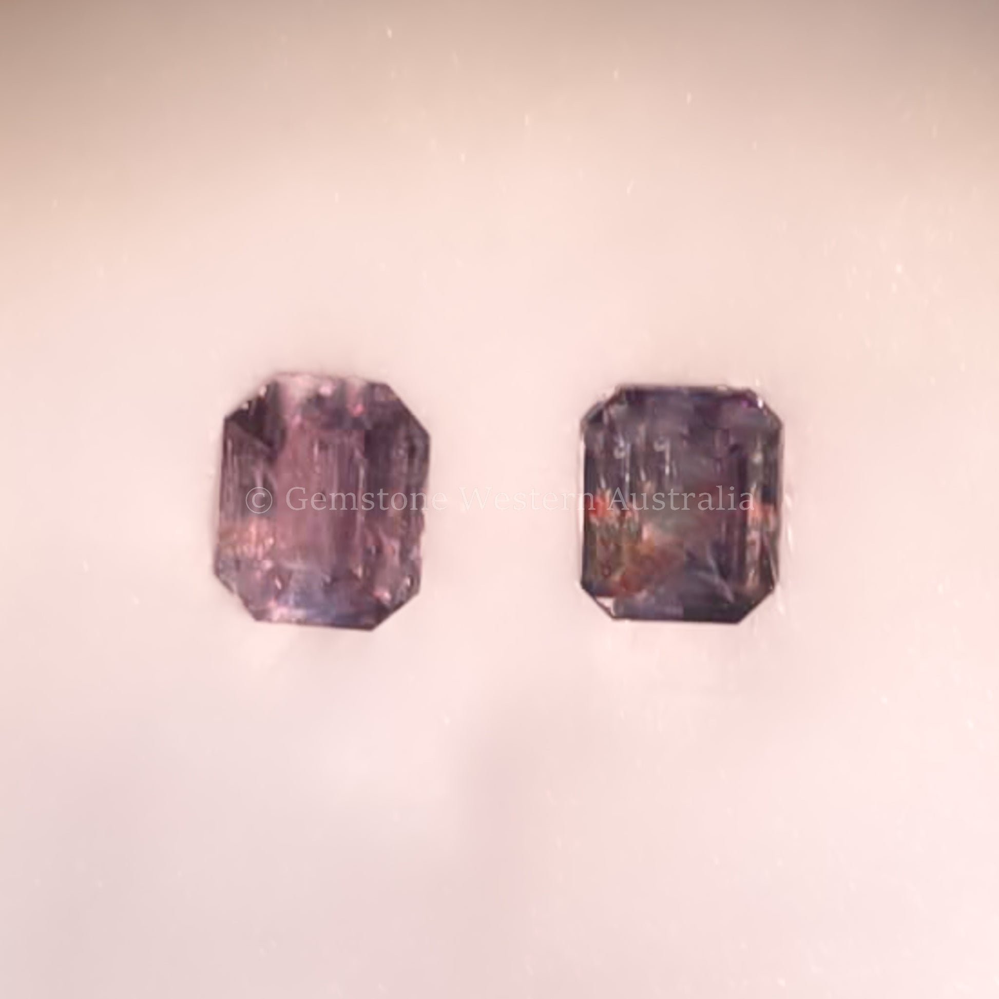 0.78 CT NATURAL ALEXANDRITE PAIR - EMERALD CUT UNDER CANDLE LIGHT