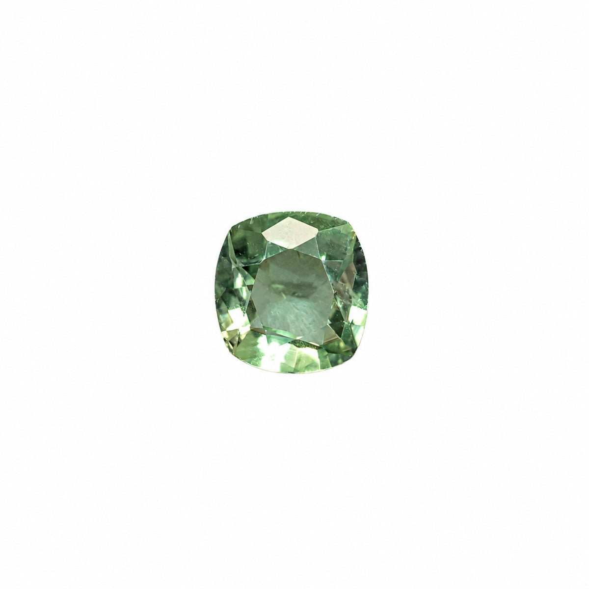 0.39 ct cushion cut alexandrite photographed in daylight
