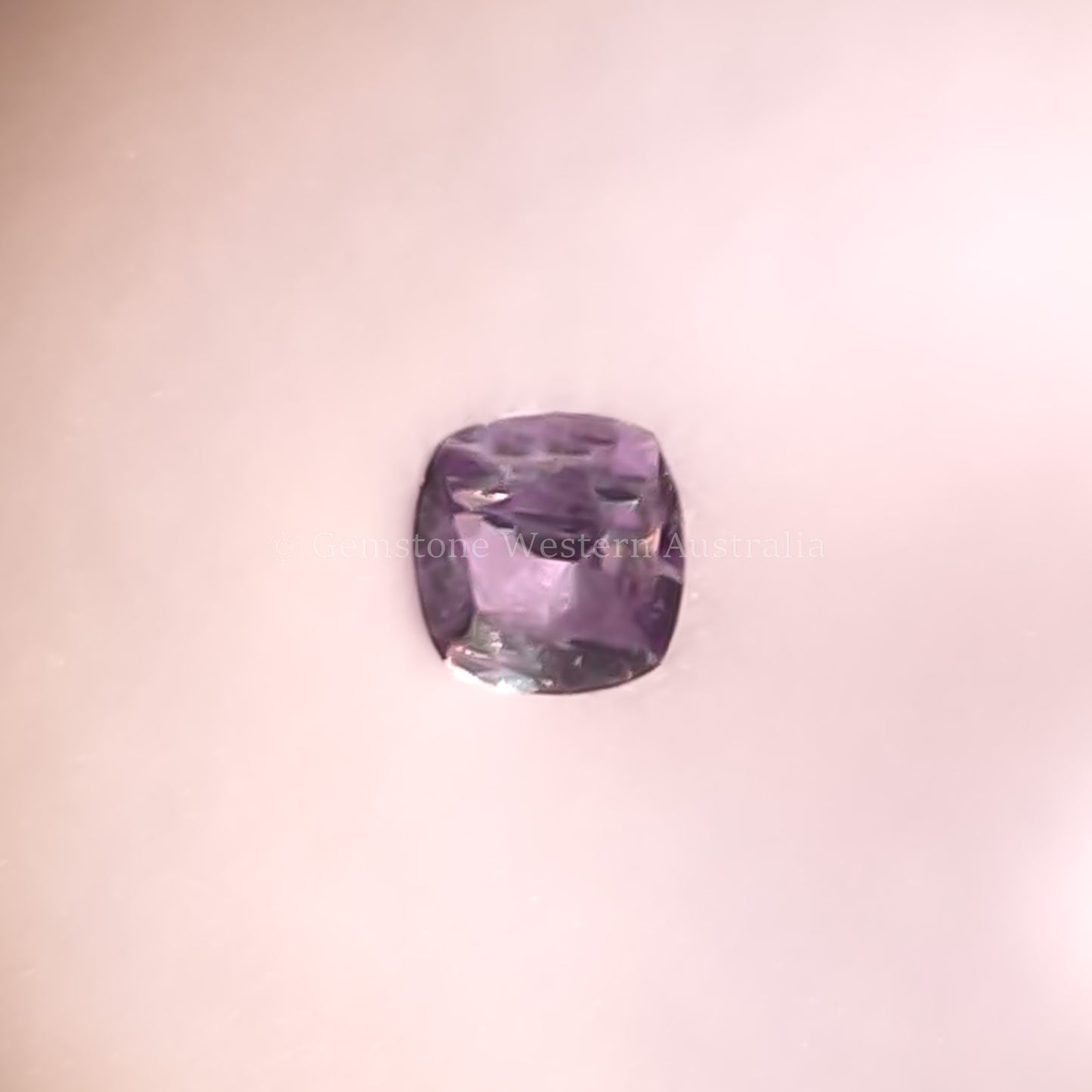 0.39 CT NATURAL ALEXANDRITE - CUSHION CUT UNDER CANDLE LIGHT