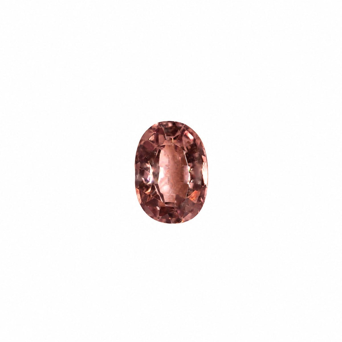 0.38 ct alexandrite under warm light showing its colour change
