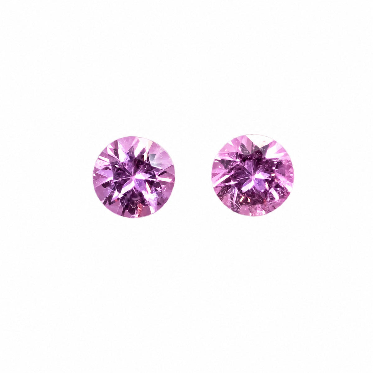 Matched pair of natural unheated pink sapphires totalling 0.98 ct, round cut