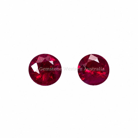 Matched pair of natural rubies totalling 0.56 ct, round cut