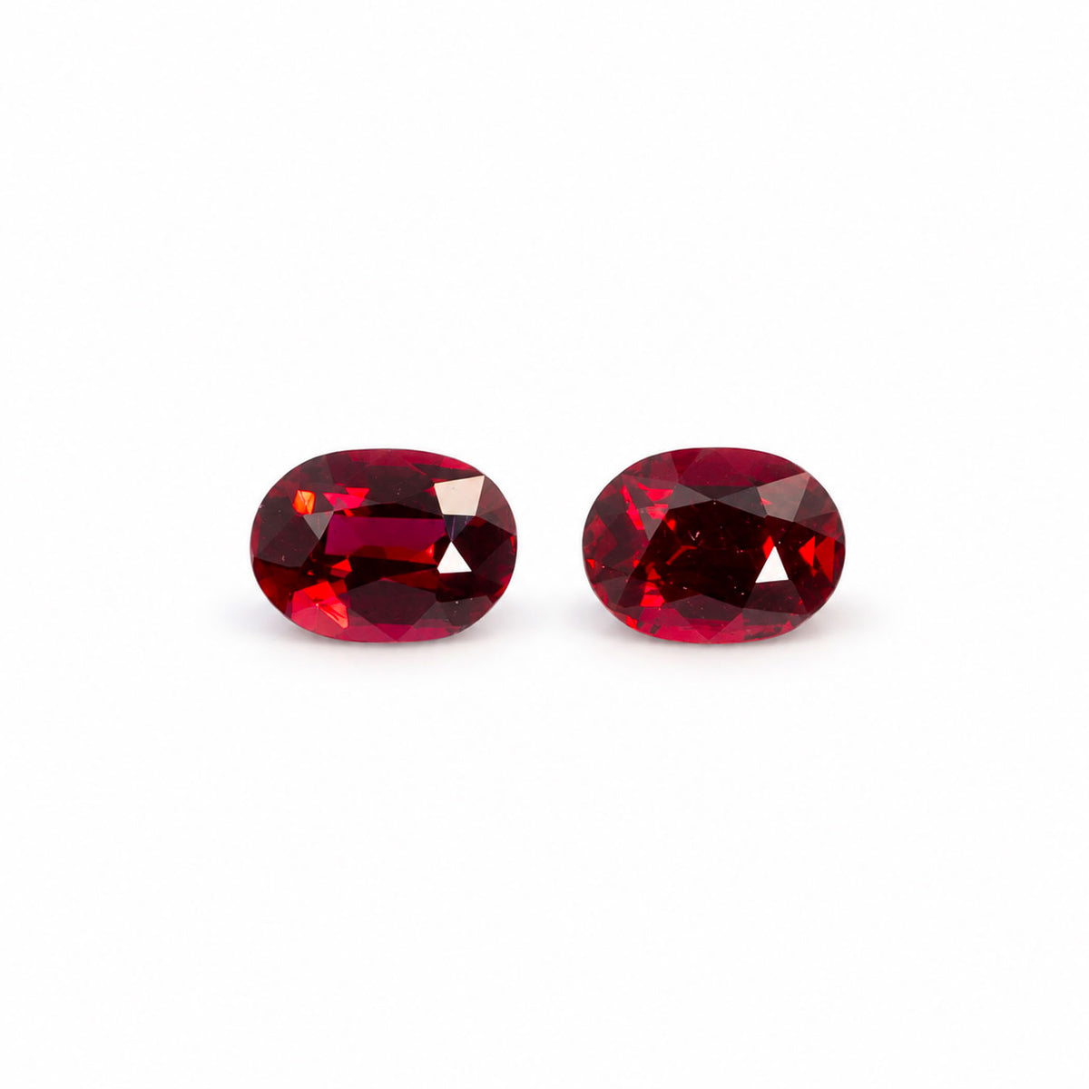 0.77ct matching pair of natural unheated rubies, royal red oval cut