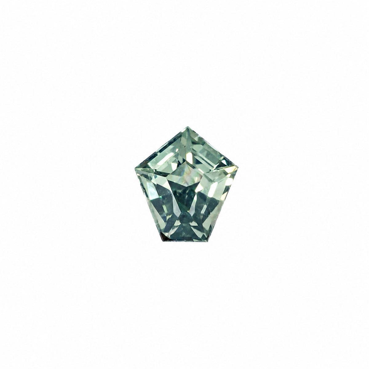 0.61 ct natural unheated teal-green sapphire, shield fancy cut