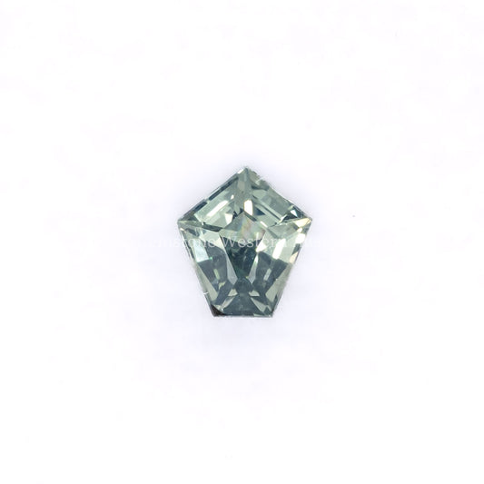 Front view of 0.61CT Natural Unheated Teal-Green Sapphire – Shield Fancy Cut in white background.