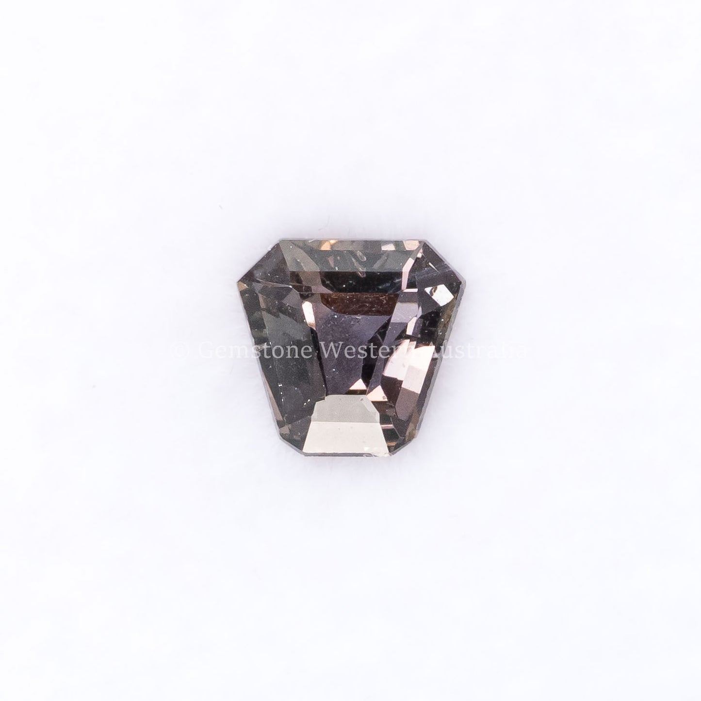 Front view of 0.79CT Natural Unheated Teal-Green Sapphire – Shield Fancy Cut in white background.