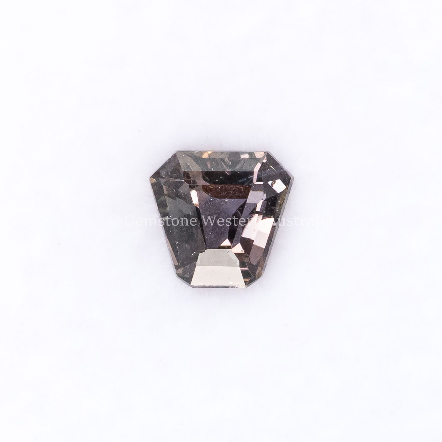 Front view of 0.79CT Natural Unheated Teal-Green Sapphire – Shield Fancy Cut in white background.