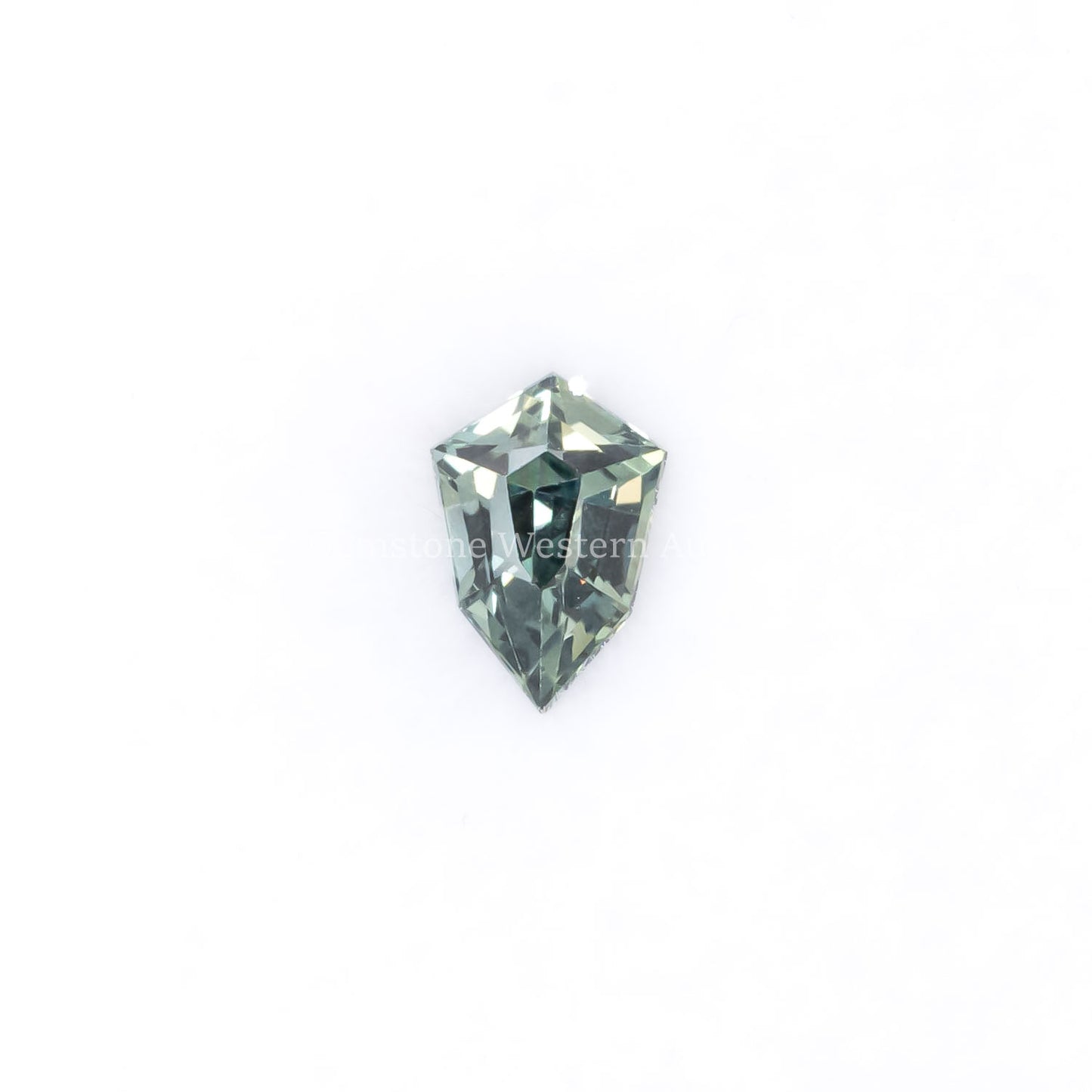 Front view of 0.45CT Natural Unheated Teal-Green Sapphire – Shield Fancy Cut in white background.