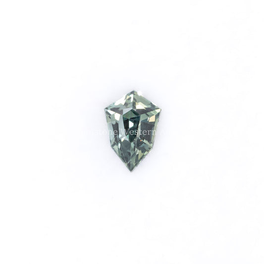 Front view of 0.45CT Natural Unheated Teal-Green Sapphire – Shield Fancy Cut in white background.