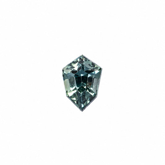 0.65 ct natural unheated teal-green sapphire, shield fancy cut