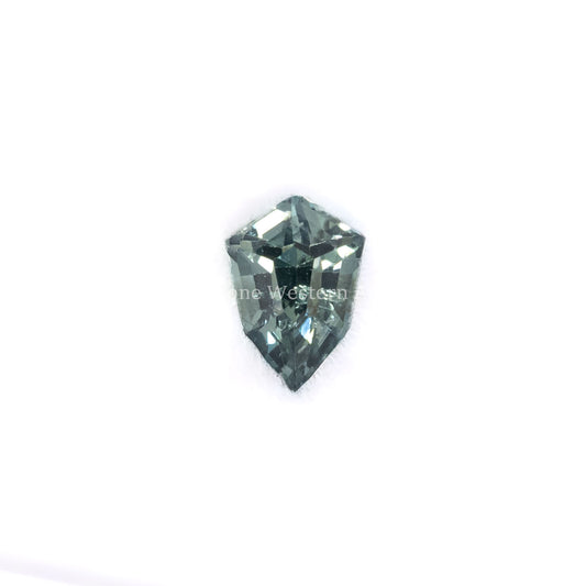 Front view of 0.51CT Natural Unheated Teal-Green Sapphire – Shield Fancy Cut in a white background