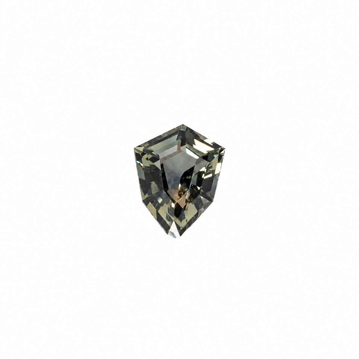 0.53 ct natural unheated teal-green sapphire, shield fancy cut