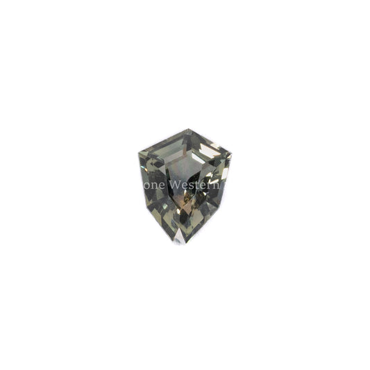 Front view of 0.53CT Natural Unheated Teal-Green Sapphire – Shield Fancy Cut in a white background.