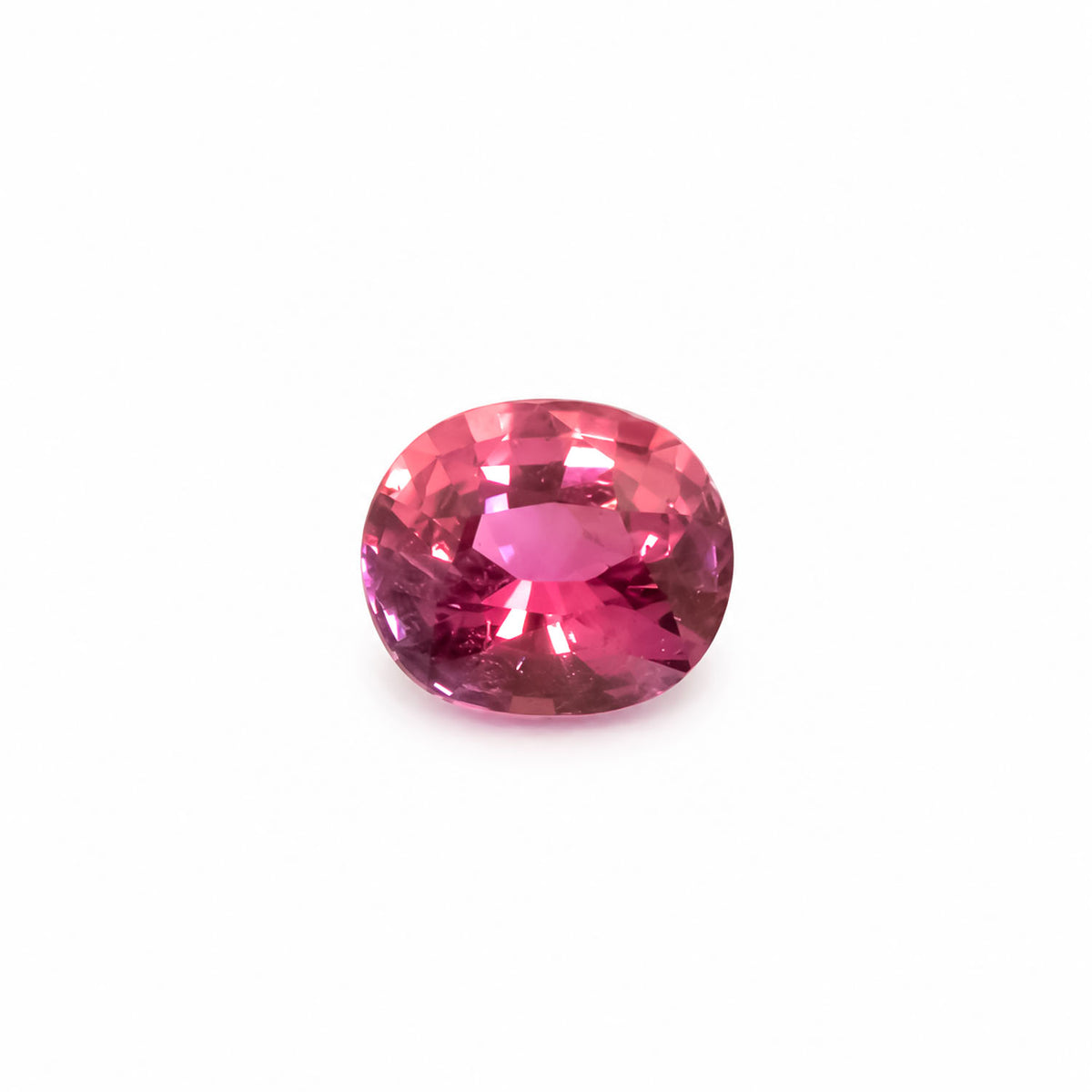 0.63ct natural unheated orangish pink padparadscha sapphire, oval mixed cut