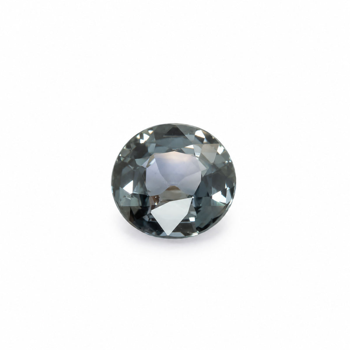 1.55ct natural peacock colour change sapphire, oval cut, showing grey-green tones