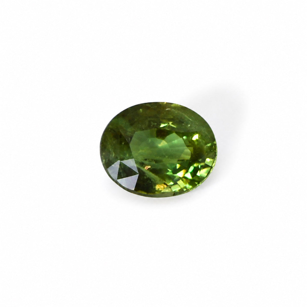 4.14 ct natural alexandrite showing its colour change under warm light