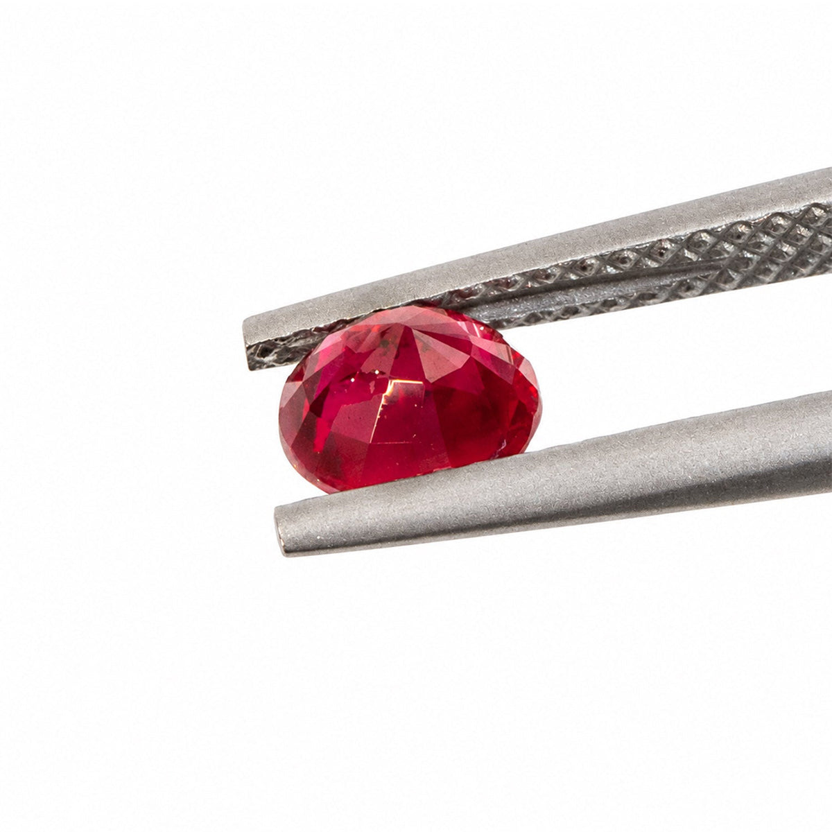 Side view of the 1.0 ct natural unheated round ruby