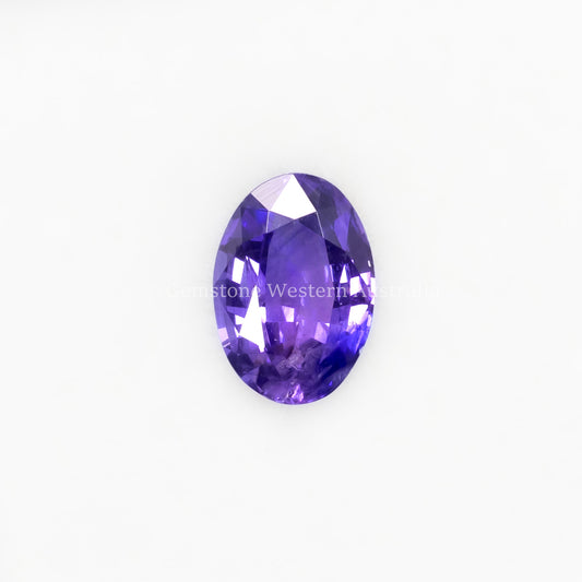 Front view of 0.98 Ct Natural Violetish Blue Sapphire Loose Gemstone Oval Cut in white background.