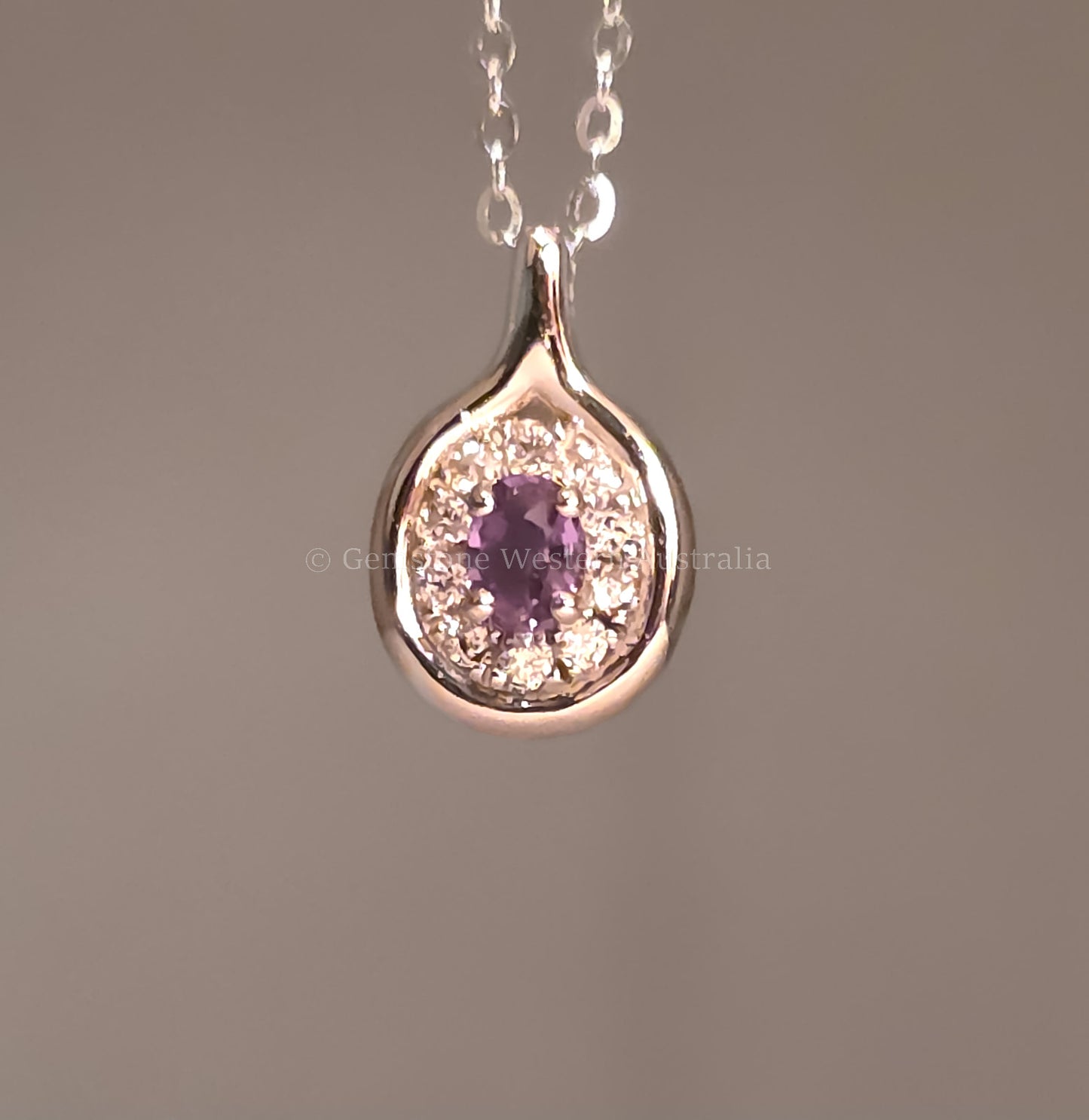Platinum Alexandrite and Diamond Pendant with Oval Cut Centre